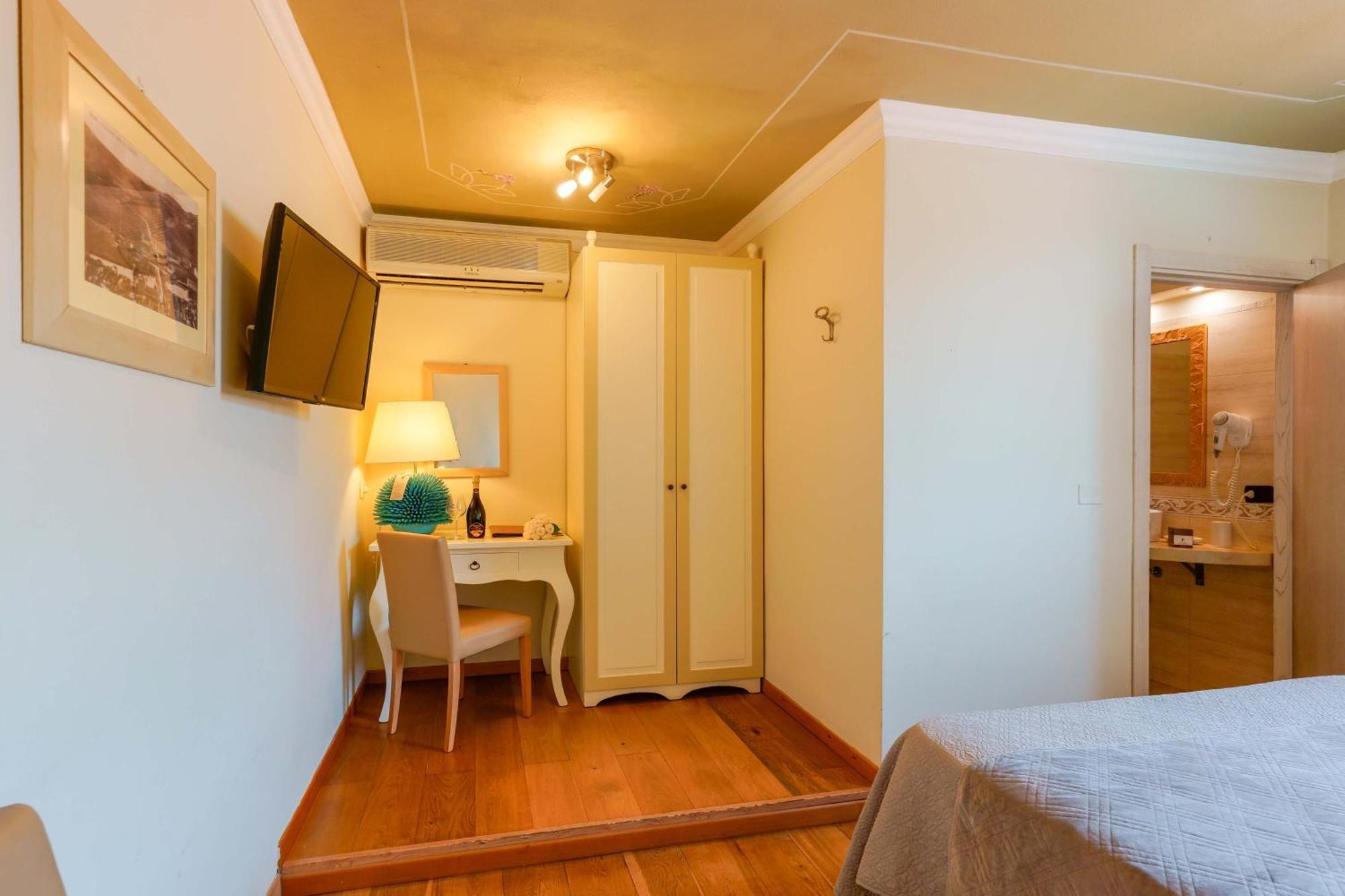 ホテル Palazzo Pischedda ボーザ 部屋 写真
